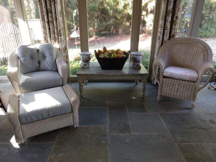 Ready for a cup o' tea? I LOVE this glassed-in sunroom. It looks out over the manicured side yard and pool, to the pool house. Wicker furniture was MADE for such places!