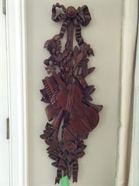 One of a pair of hand carved mahogany musical-themed wall sconces, L-R facing.