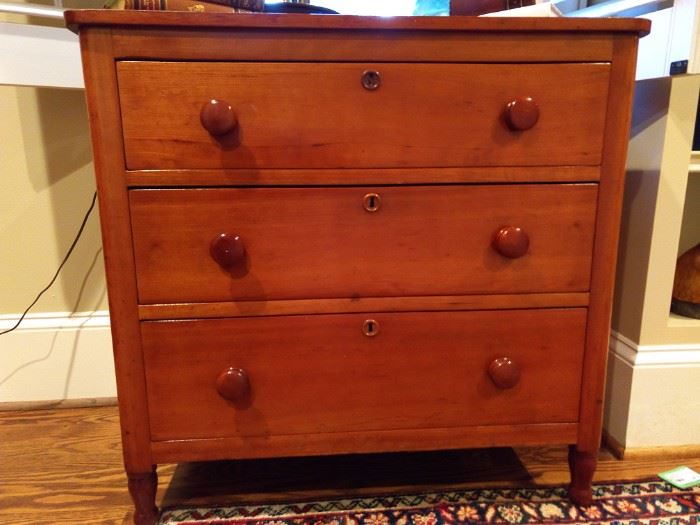 Simple and elegant describes this sweet little American pine 3-drawer chest.