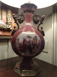 One of a pair of Asian porcelain lamps, with bronze mounts and suede shades.