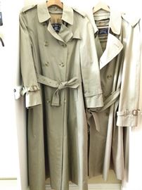 Pair of vintage Burberrys' trench coats.                                     The men's version is size 44 Regular.                                      The women's version is size 10 XL.