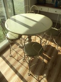 Round Marble Table and Wrought Iron Chairs https://ctbids.com/#!/description/share/86915