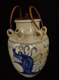 Antique Chinese dragon decorated water / wine jar