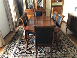 Raylen Vineyards Dining Set with Pads. 2 Leaves and 8 Leather Covered Chairs