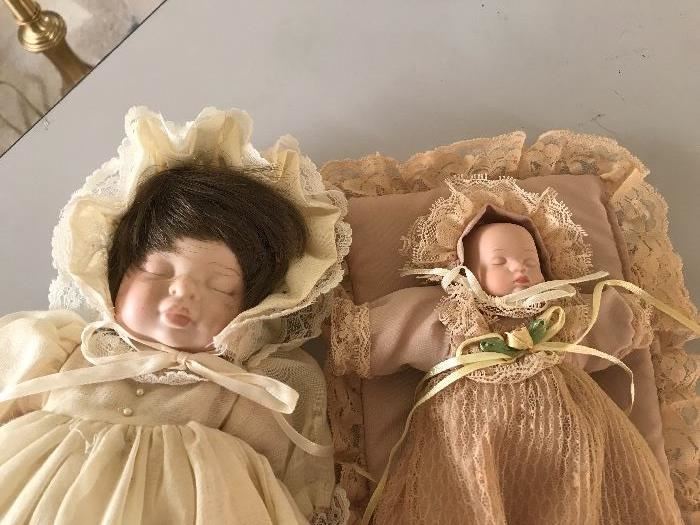 Porcelain doll and baby 