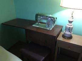 Sewing machine and cabinet