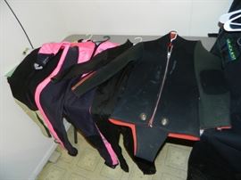 Many scuba suits in youth and adult sizes/styles