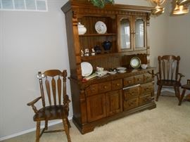 Dining room hutch with 8 chairs - 2 captains
