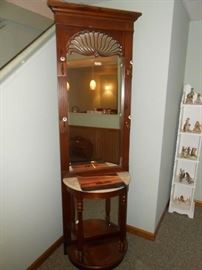 Basement mirrored coat rack