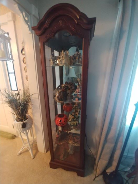 Mahogany curio cabinet this cabinet is a great size lights up has a mirrored back and adjustable shelves $120