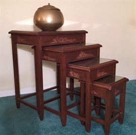 Hand carved nesting tables with glass tops