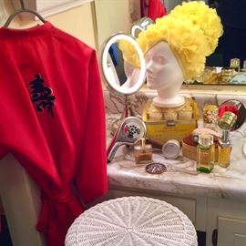 Vintage flower petal shower/swim cap, vintage perfumes, hot rollers, and other vanity items. 