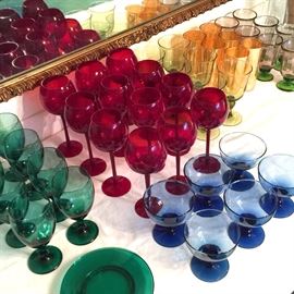 A variety of colored glass stemware 