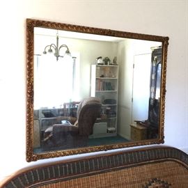 Large, gilt framed wall mirror