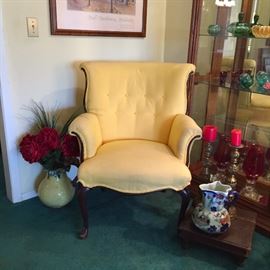 Upholstered chair in butter yellow fabric