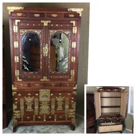 Antique Korean storage cabinet with brass hardware and intricate abalone inlay 