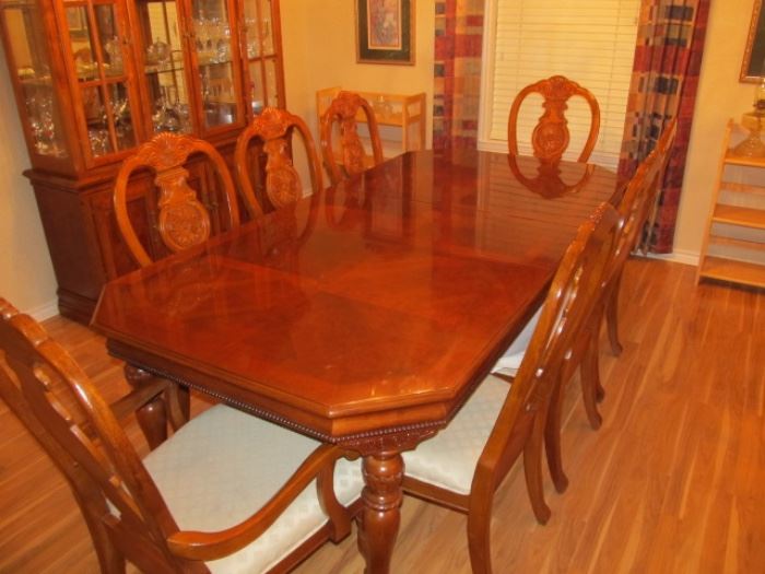 dining table 7' as shown, with one 15" leaf; six sidecars and two armchairs