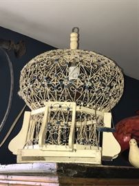 Antique wood and metal bird cage.