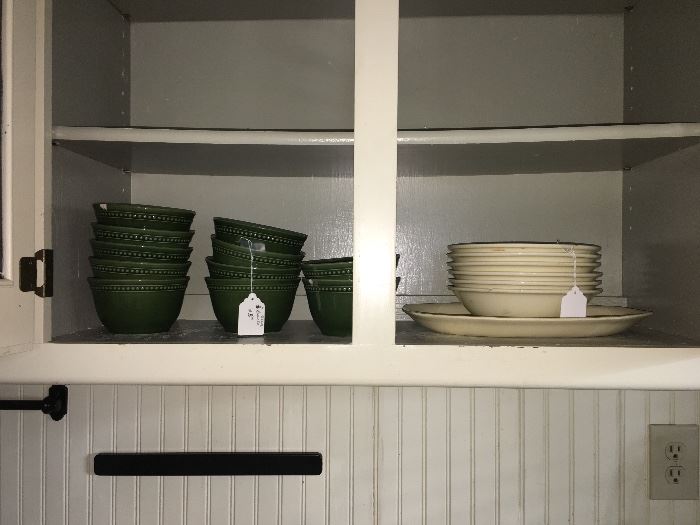 Green bowls and cream dishes