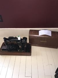 Vintage Singer sewing machine with wood case