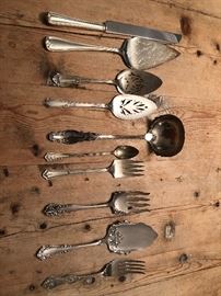 All miscellaneous silver plate or stainless serving pieces. 