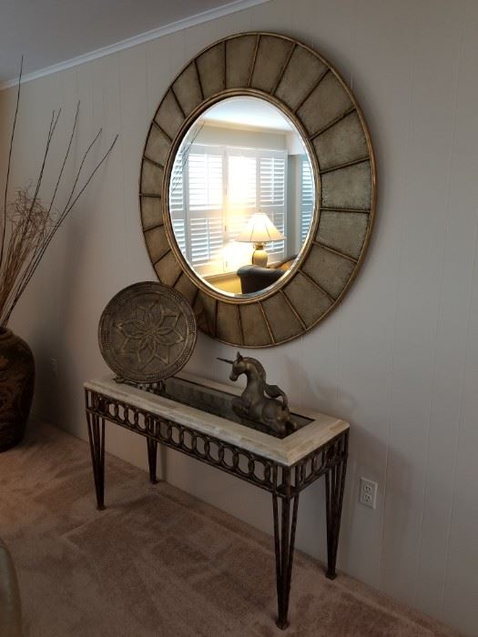 Accent table, mirror and decor