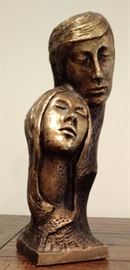 Bronze colored Male and Female Bust