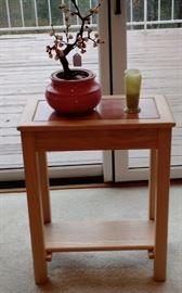 Small Blonde Wood Table with Pink Tile inserts on top with bottom shelf.   24" high, 12.5" deep,