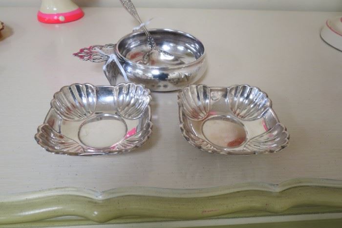 Sterling silver nut dishes.