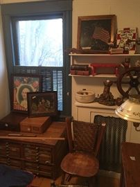 upstairs front room- type chest, patriotic pictures, file cabinets
