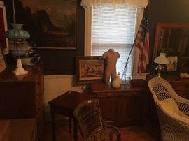 large scenic oil painting, blue and white glass lamp, Flo Blue bowl and pitcher set, antique needlepoint "Gleaner" in beautiful walnut frame, milk glass decanter set, side board