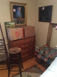Upstairs back bedroom- large framed boy picture, oil painting, amtique four drawer chest, antique stool, quilts