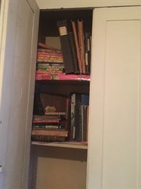 upstairs hall cupboard- books