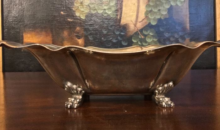 Sterling silver vegetable bowl featuring paw feet