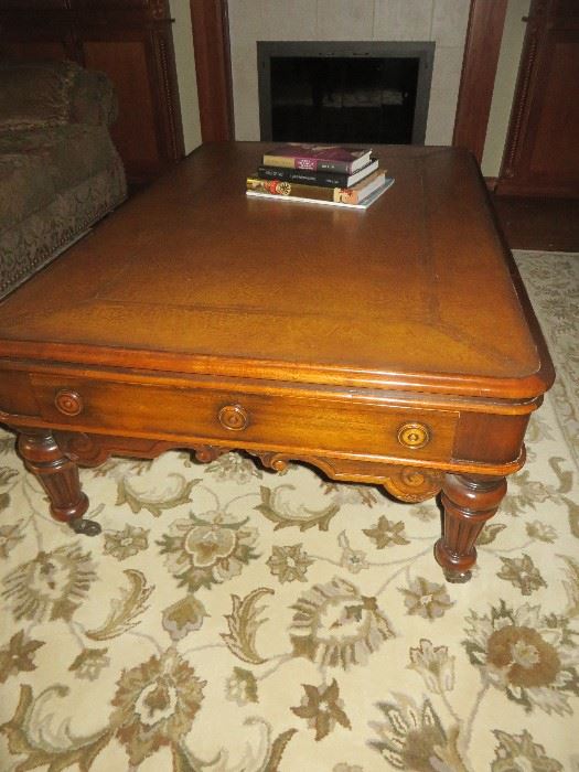 LEATHER TOP COFFEE TABLE ON COASTERS
THEODORE ALEXANDER
