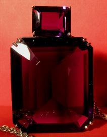 511 carat deep purple amethyst mounted in a 14K white gold cradle 