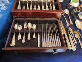 one of two silver plated flatware sets 