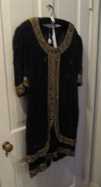 Part of the Huge Collection of ladies famous designer label, clothes, purses, shoes, lingerie, etc. only part of it photographed. 