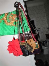 Part of the Huge Collection of ladies famous designer label clothes, St. John, Chico, Neiman Marcus, Saks etc. , purses, shoes, lingerie, etc. only part of it photographed. 