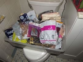 Part of the Huge Collection of ladies famous designer label clothes, St. John, Chico, Neiman Marcus, Saks etc. , purses, shoes, lingerie, etc. only part of it photographed. 