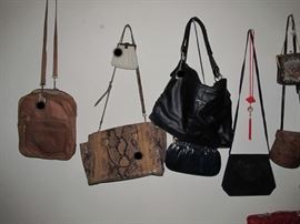 Part of the Huge Collection of ladies famous designer label clothes, St. John, Chico, Neiman Marcus, Saks etc. , purses, shoes, lingerie, etc. only part of it photographed. 