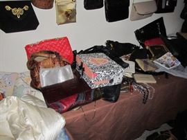 Part of the Huge Collection of ladies famous designer label clothes, St. John, Chico, Neiman Marcus, Saks etc. , purses, shoes, lingerie, etc. only part of it photographed. 