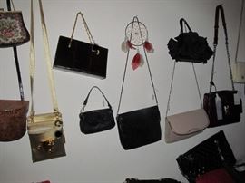 Part of the Huge Collection of ladies famous designer label clothes, St. John, Chico, Neiman Marcus, Saks etc. , purses, shoes, lingerie, etc. only part of it photographed. 