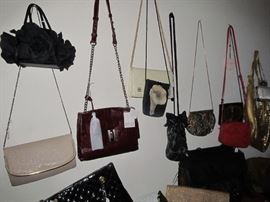 Part of the Huge Collection of ladies famous designer label clothes, St. John, Chico, Neiman Marcus, Saks etc. , purses, shoes, lingerie, etc. only part of it photographed. 