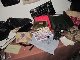 Part of the Huge Collection of ladies famous designer label clothes, St. John, Chico, Neiman Marcus, Saks etc. , purses, shoes, lingerie, etc. only part of it photographed. 