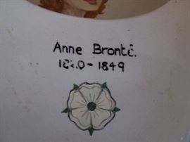 Mystery piece. Made by Boots Chemical Co. in the 19th. century. The mystery is what is Anne Bronte's painted portrait doing painted on a bed pan?  She was a famous author and this is a bed pan.