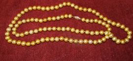 heavy gold colored pearls with 14K clasp