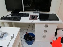 desk plus computer monitors 