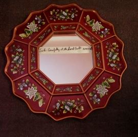 Look carefully at the beautiful hand painted enamel work.