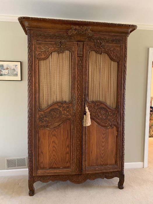 Two-of-a-kind custom made French oak wedding armoire from early to mid 1800s.   (It's match is found at the Biltmore!)